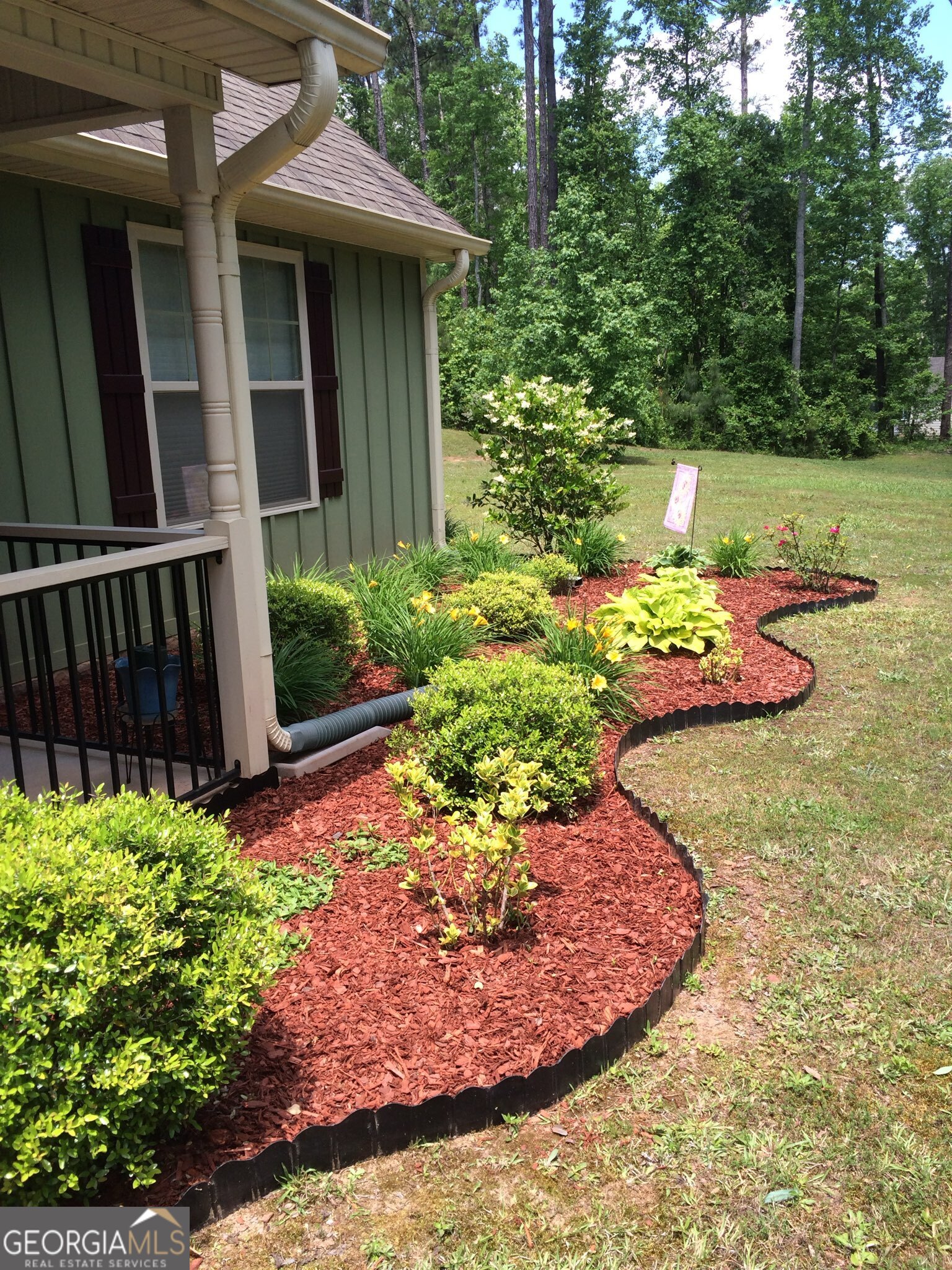 950 John Lovelace Road LaGrange, GA 30241 - Photo 9 of 47 a view of a backyard with plants