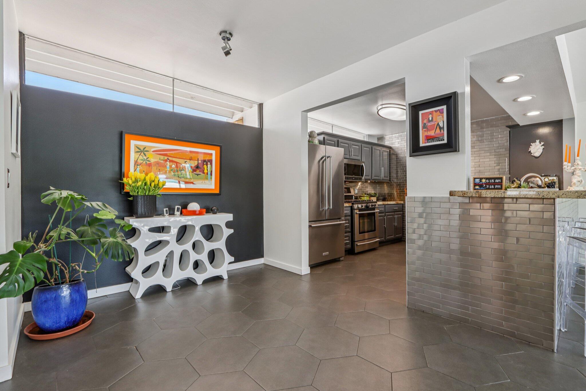 1815 West Nicola Road Palm Springs, CA 92262 - Photo 11 of 30 a view of a livingroom with furniture and a flat screen tv