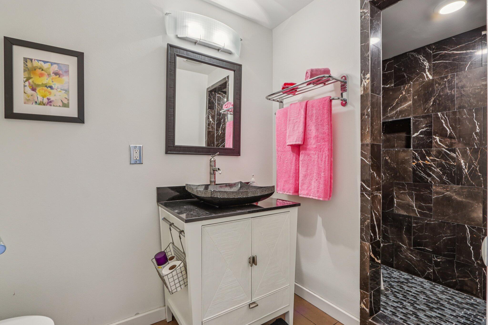 1815 West Nicola Road Palm Springs, CA 92262 - Photo 15 of 30 a bathroom with a granite countertop sink a mirror and shower