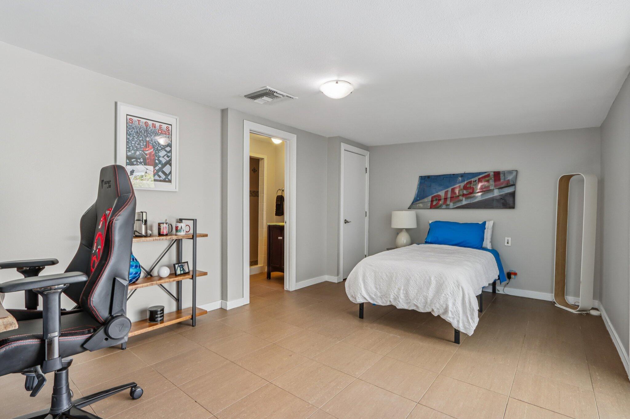 1815 West Nicola Road Palm Springs, CA 92262 - Photo 24 of 30 a bedroom with furniture and a gym equipment