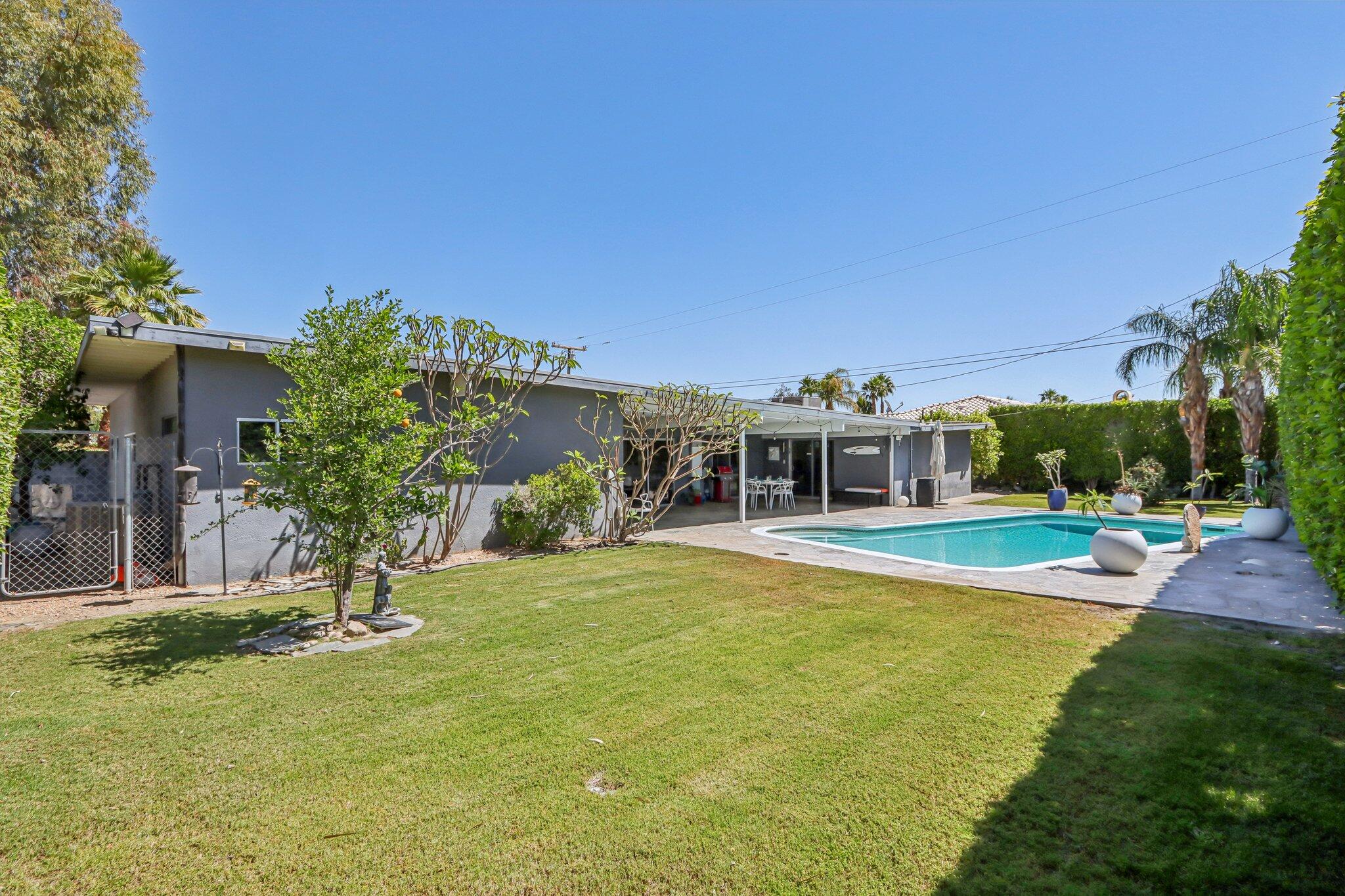 1815 West Nicola Road Palm Springs, CA 92262 - Photo 30 of 30 a view of a house with swimming pool and sitting area