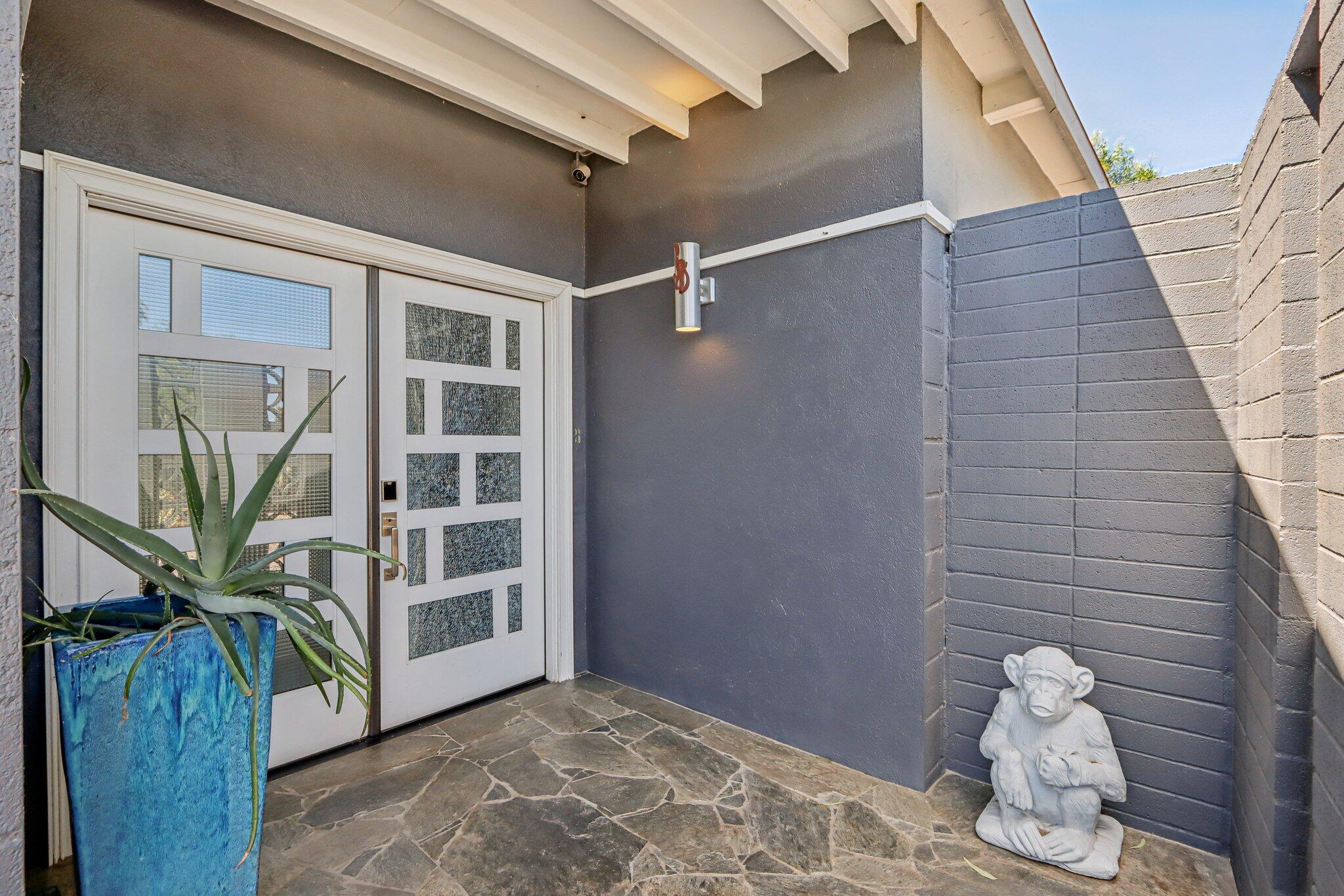 1815 West Nicola Road Palm Springs, CA 92262 - Photo 4 of 30 a view of an entryway with wooden floor