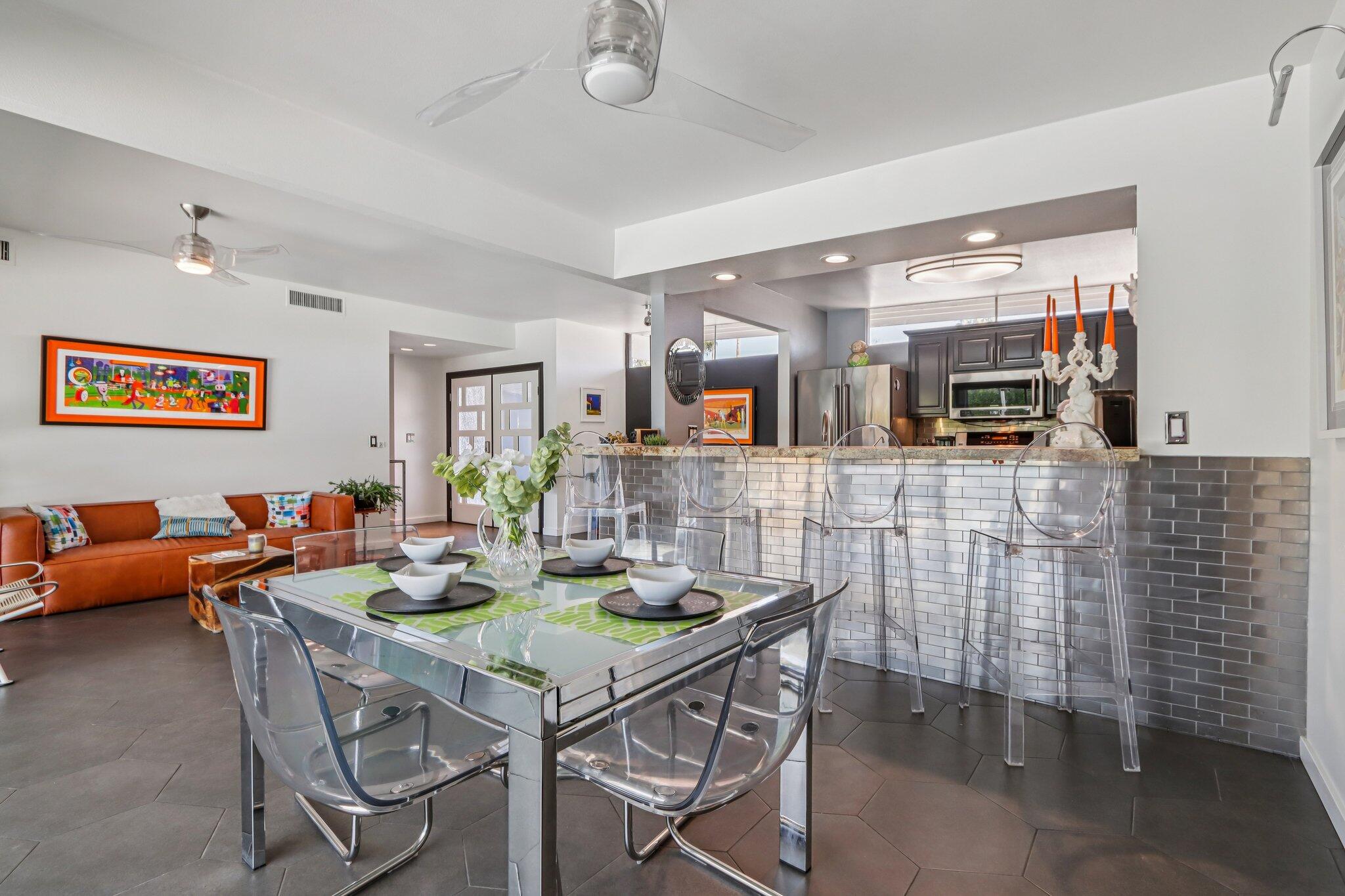 1815 West Nicola Road Palm Springs, CA 92262 - Photo 10 of 30 a view of a dining room with furniture