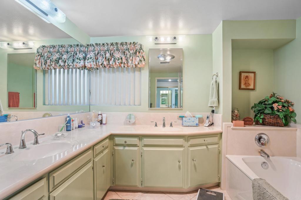 10951 Rim Road Escondido, CA 92026 - Photo 29 of 55 a bathroom with a sink double vanity and a mirror
