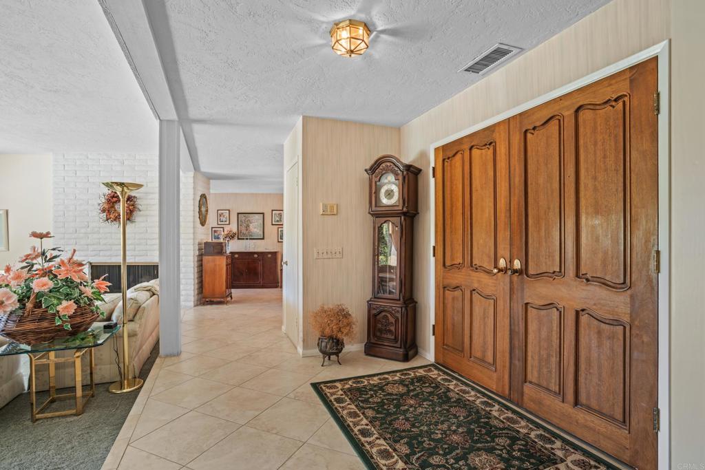 10951 Rim Road Escondido, CA 92026 - Photo 9 of 55 a view of entryway with livingroom and furniture