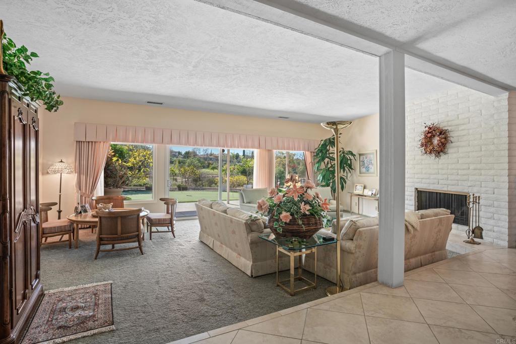 10951 Rim Road Escondido, CA 92026 - Photo 10 of 55 a living room with furniture and a large window