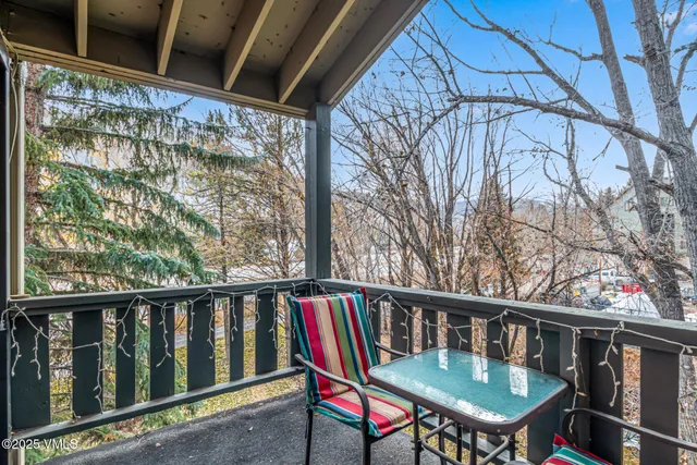 a view of balcony with furniture