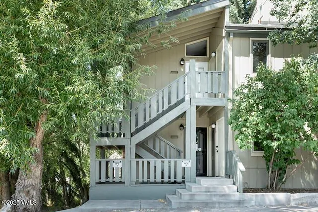 front view of a house with a small yard