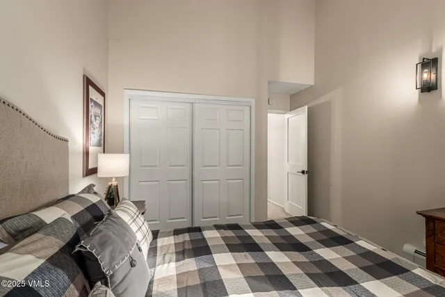 a room with a bed and a window