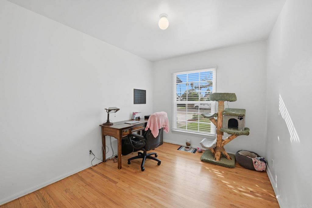 6974 Capistrano Way Riverside, CA 92504 - Photo 16 of 24 a view of a workspace with furniture and a window