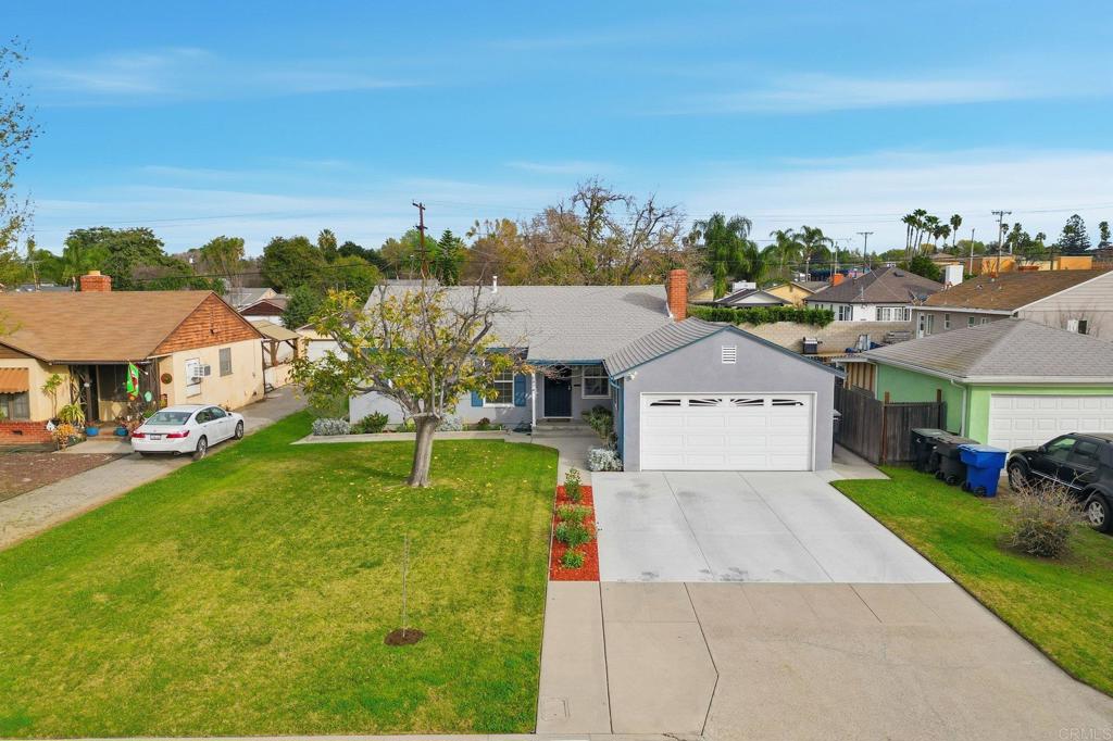 6974 Capistrano Way Riverside, CA 92504 - Photo 21 of 24 a front view of a house with a yard