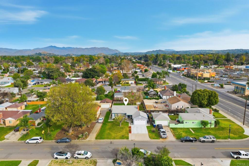 6974 Capistrano Way Riverside, CA 92504 - Photo 22 of 24 an aerial view of residential houses with outdoor space