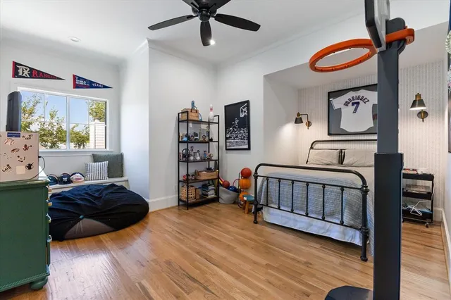 a bathroom with a granite countertop sink a toilet and a mirror