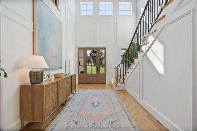 a living room with fireplace furniture and a flat screen tv