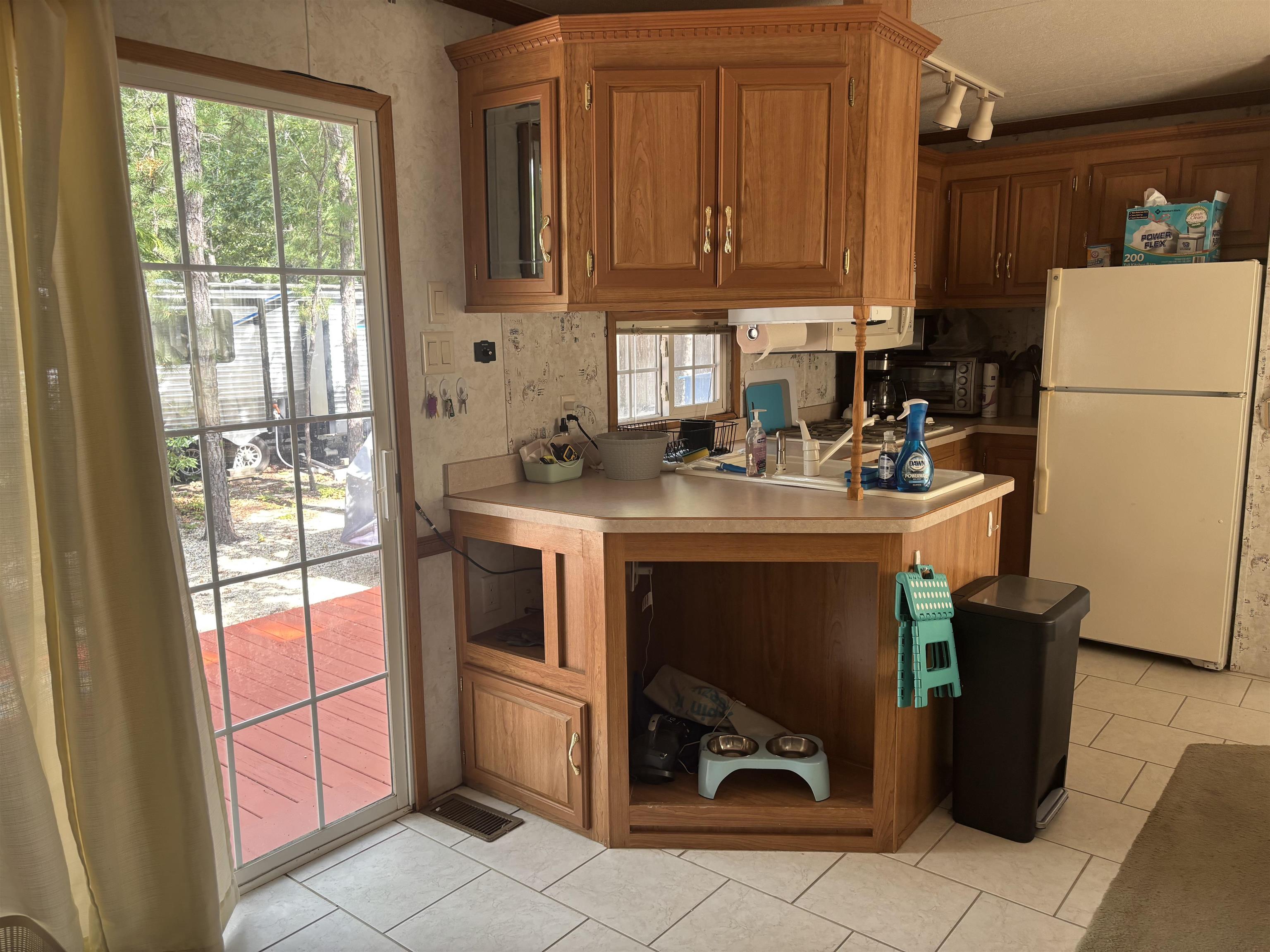 60 Corsons Tavern Road Ocean View, NJ 08230 - Photo 12 of 17 a utility room with fridge dryer and washer