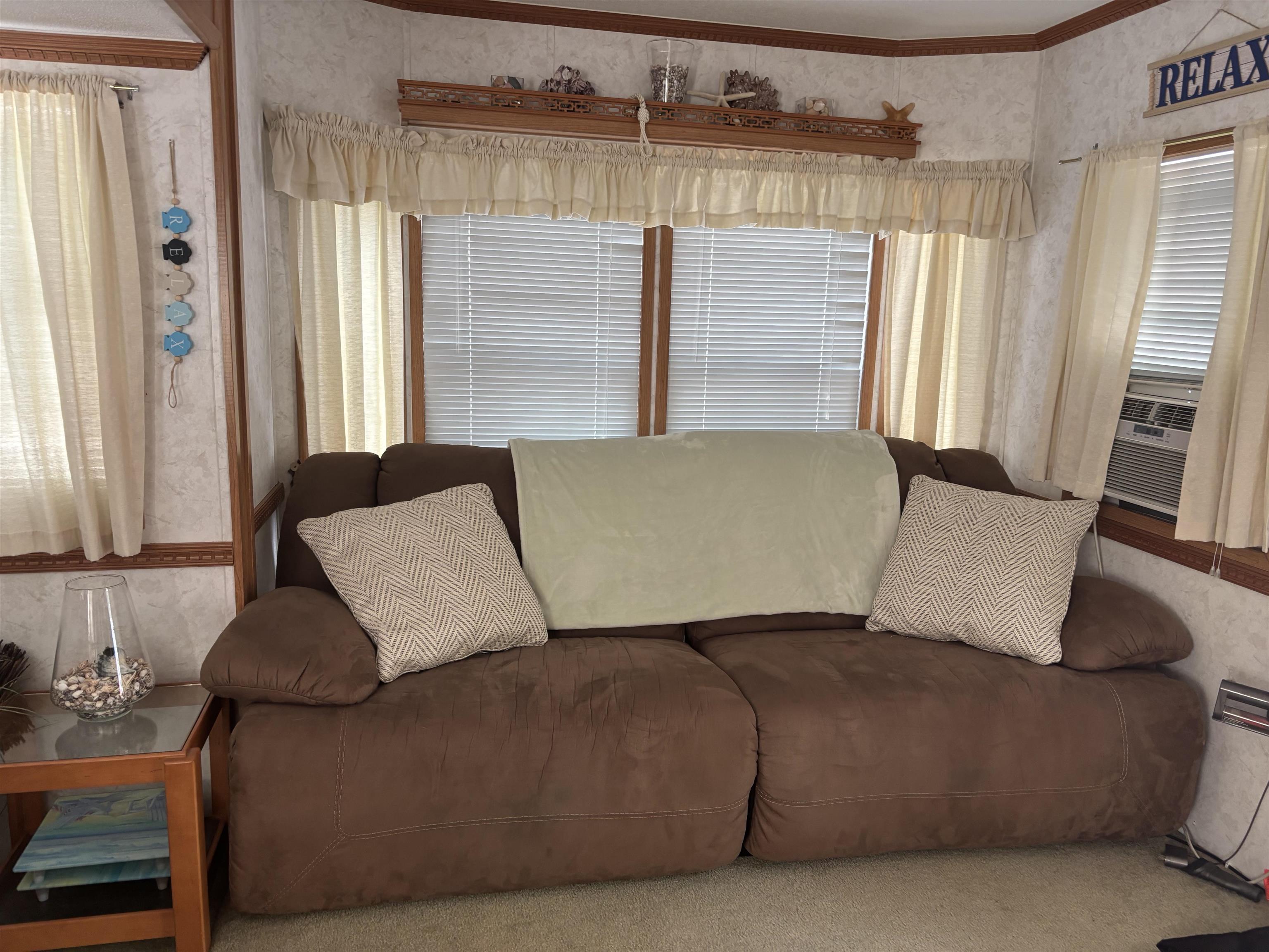 60 Corsons Tavern Road Ocean View, NJ 08230 - Photo 7 of 17 a living room with furniture and a window