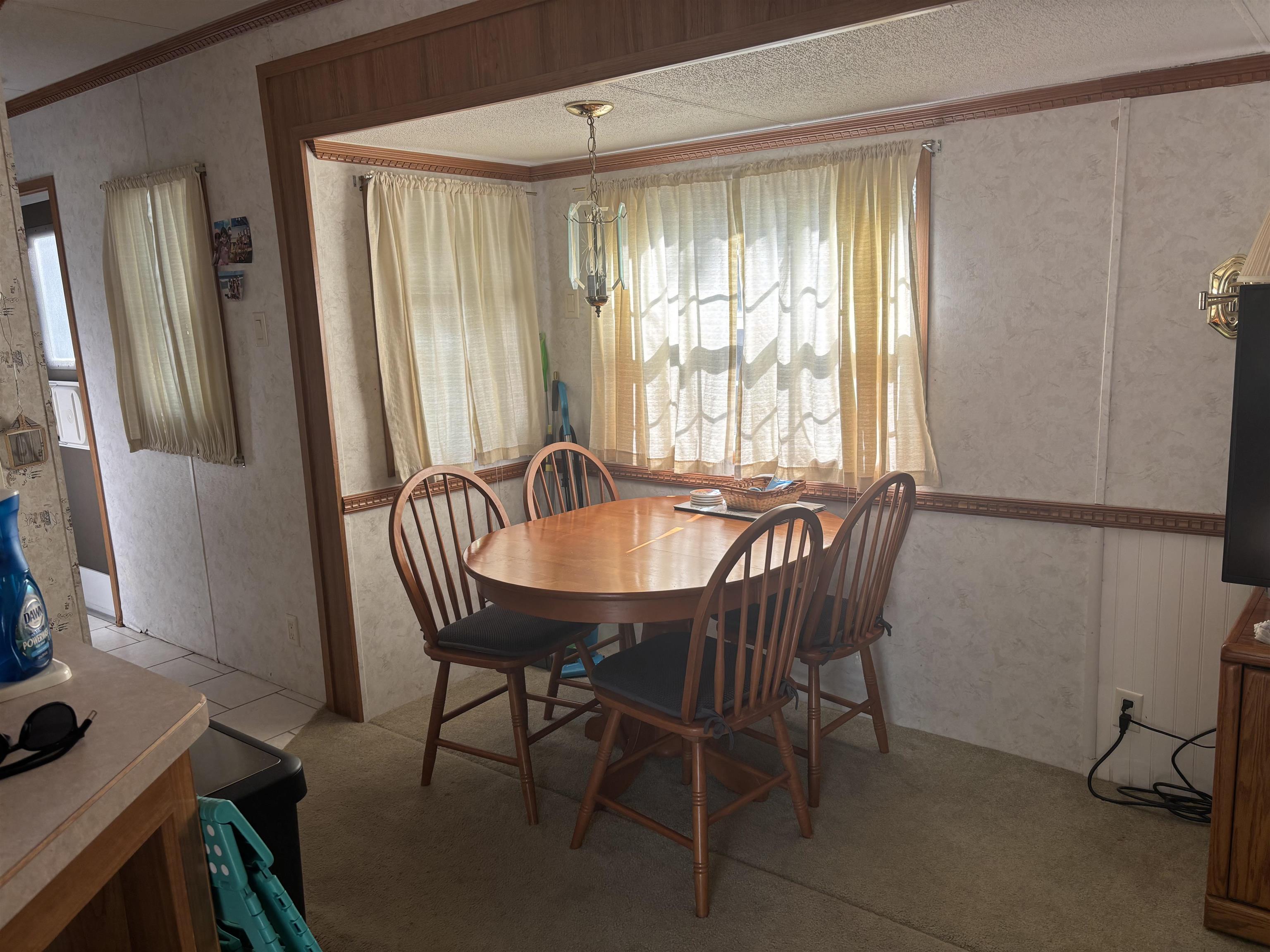 60 Corsons Tavern Road Ocean View, NJ 08230 - Photo 8 of 17 a view of a dining room with furniture and window