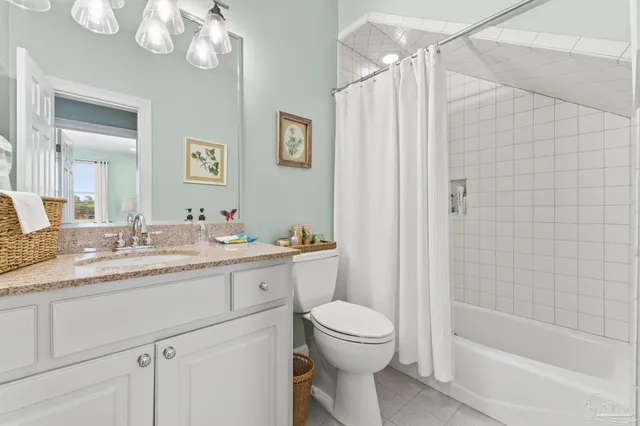 a bedroom with furniture and flat screen tv