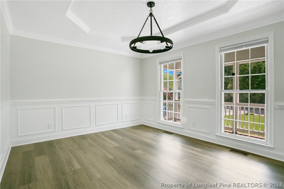 5809 Waldwick Road Fayetteville, NC 28311 - Photo 12 of 33 a view of a room with window wooden floor and windows
