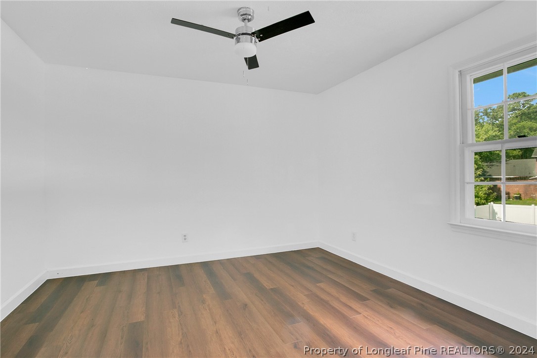 5809 Waldwick Road Fayetteville, NC 28311 - Photo 18 of 33 a view of a room that has wooden floor and window