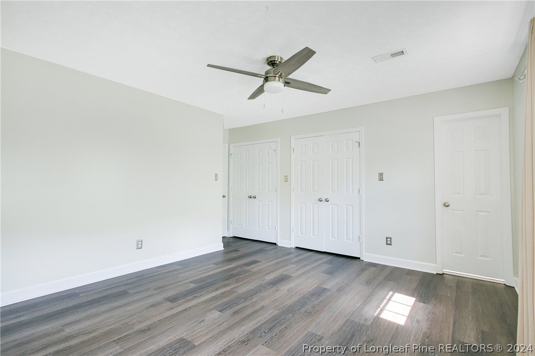 5809 Waldwick Road Fayetteville, NC 28311 - Photo 20 of 33 a view of empty room with wooden floor