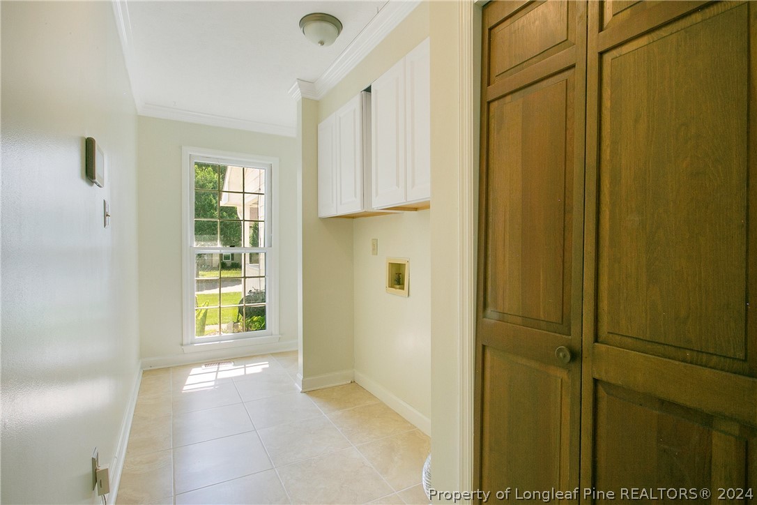5809 Waldwick Road Fayetteville, NC 28311 - Photo 22 of 33 a view of an empty room with a window