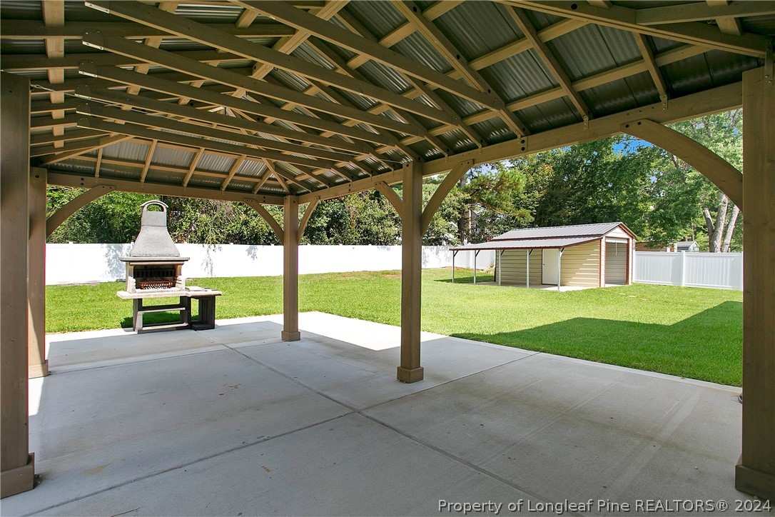 5809 Waldwick Road Fayetteville, NC 28311 - Photo 23 of 33 a view of a house with backyard and porch