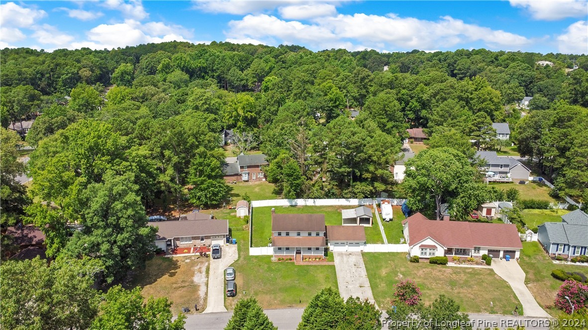 5809 Waldwick Road Fayetteville, NC 28311 - Photo 29 of 33 an aerial view of residential houses with outdoor space and trees all around