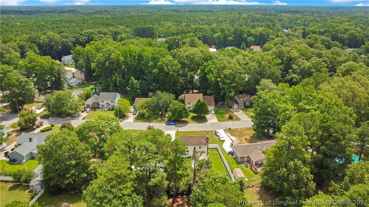 5809 Waldwick Road Fayetteville, NC 28311 - Photo 31 of 33 an aerial view of residential houses with outdoor space and trees