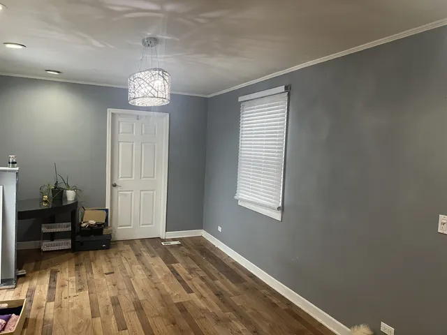 a view of livingroom with furniture and wooden floor