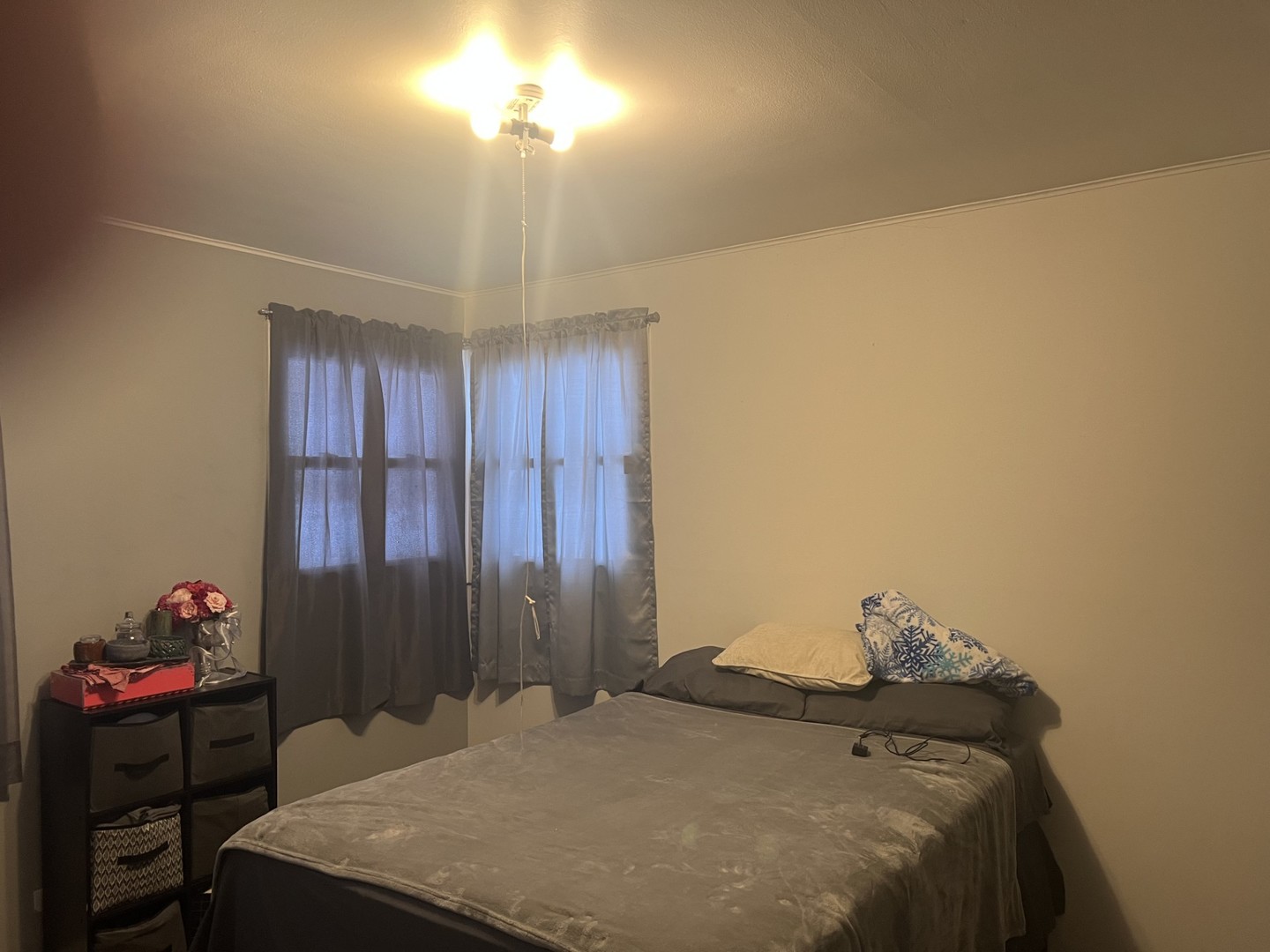 3200 Thrush Lane Rolling Meadows, IL 60008 - Photo 8 of 9 a bedroom with a bed and a cabinets