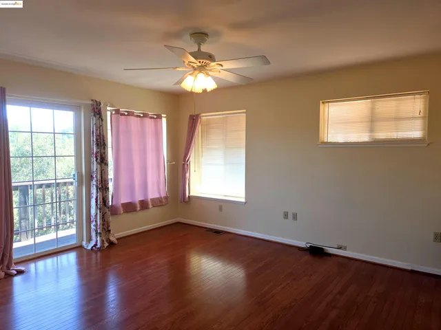 a kitchen with stainless steel appliances granite countertop a refrigerator and a stove