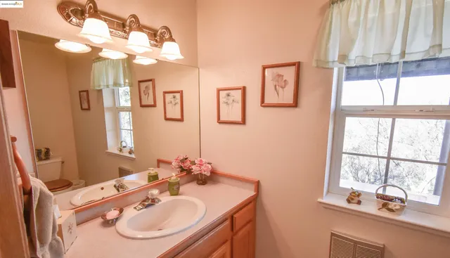 a view of a swimming pool with an outdoor seating