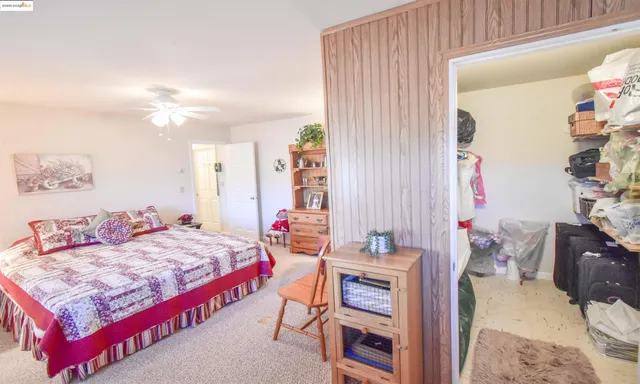 a view of house with outdoor space and sitting area