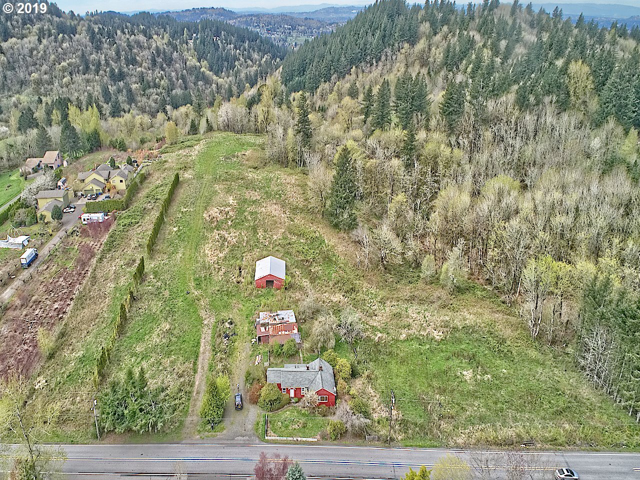 8395 Southeast Regner Road Gresham, OR 97080 - Photo 2 of 3 a view of lot of flowers and trees