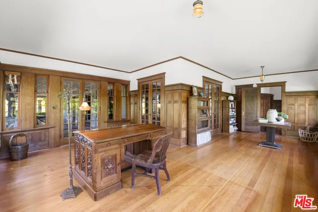 a view of a livingroom with furniture window and outside view