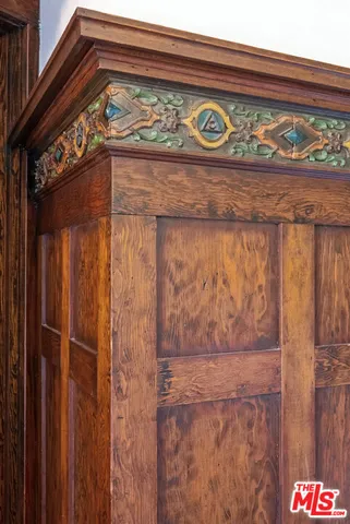 a kitchen with stainless steel appliances granite countertop a stove and a wooden floors