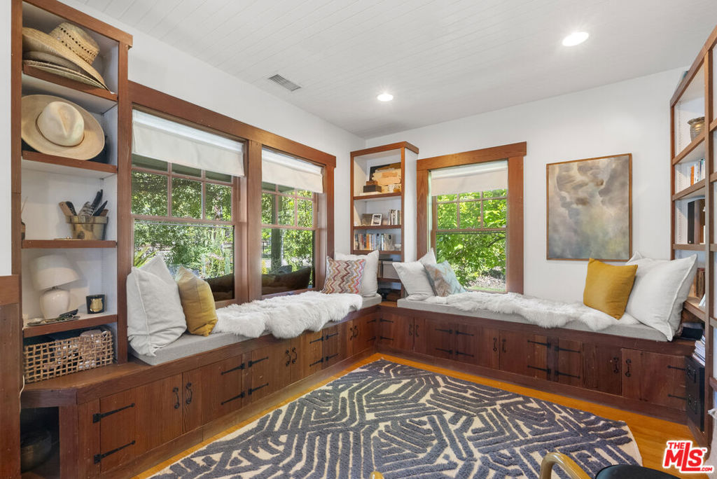 15454 South Mountain Road Santa Paula, CA 93060 - Photo 45 of 65 a bedroom with a bed and glass window