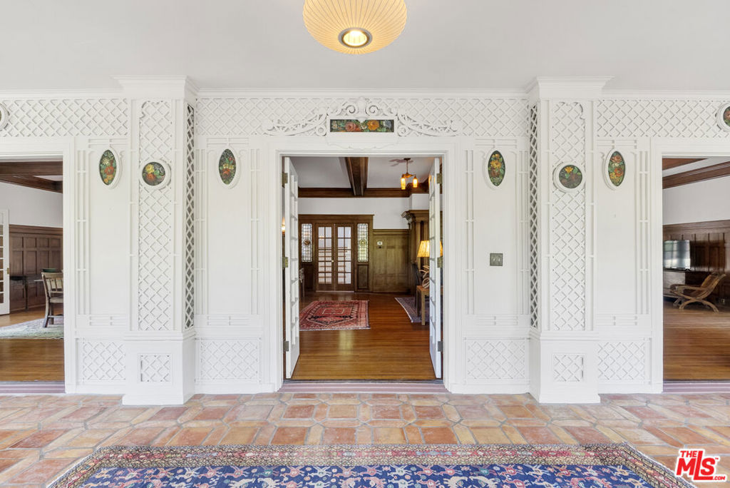15454 South Mountain Road Santa Paula, CA 93060 - Photo 6 of 65 a view of a hallway with wooden floor and living room