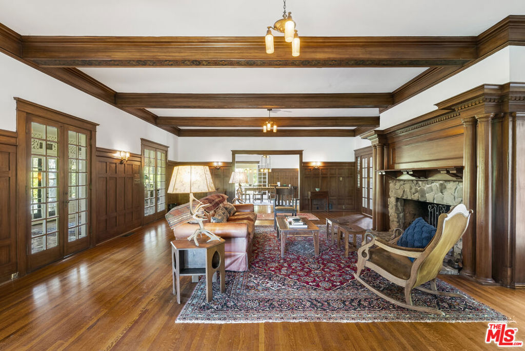 15454 South Mountain Road Santa Paula, CA 93060 - Photo 7 of 65 a living room with fireplace furniture and a floor to ceiling window