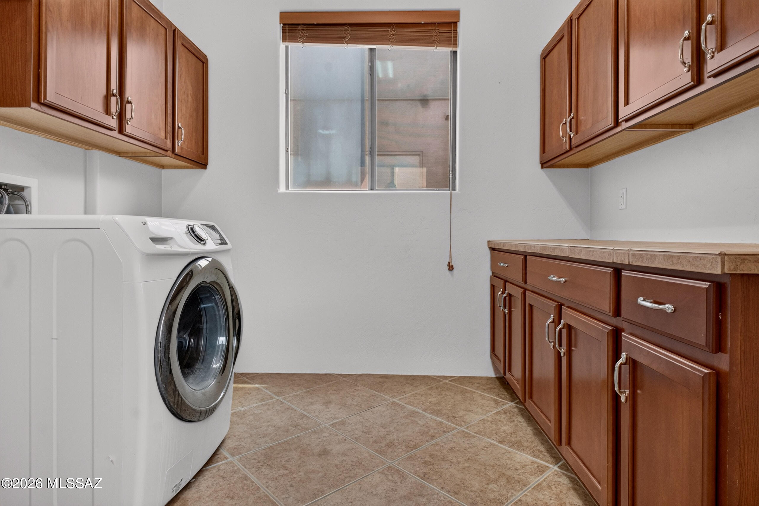 11370 North Moon Ranch Place Marana, AZ 85658 - Photo 34 of 42 Laundry Room