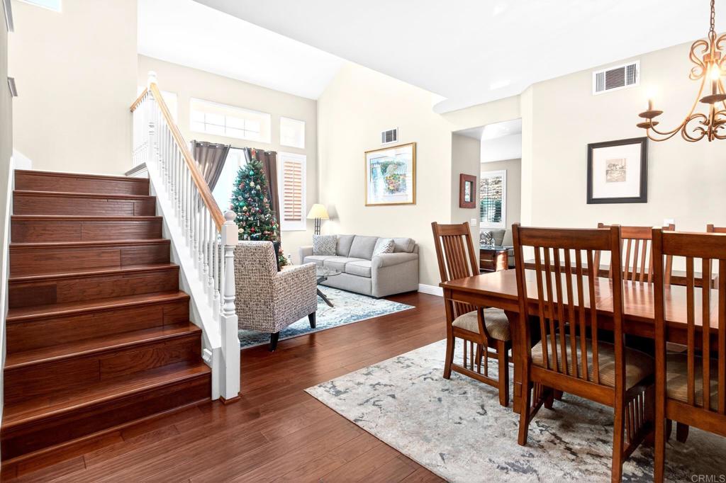 5531 Foxtail Loop Carlsbad, CA 92010 - Photo 12 of 62 a living room with furniture and a wooden floor