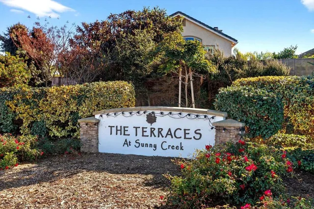 a sign on the side of the road