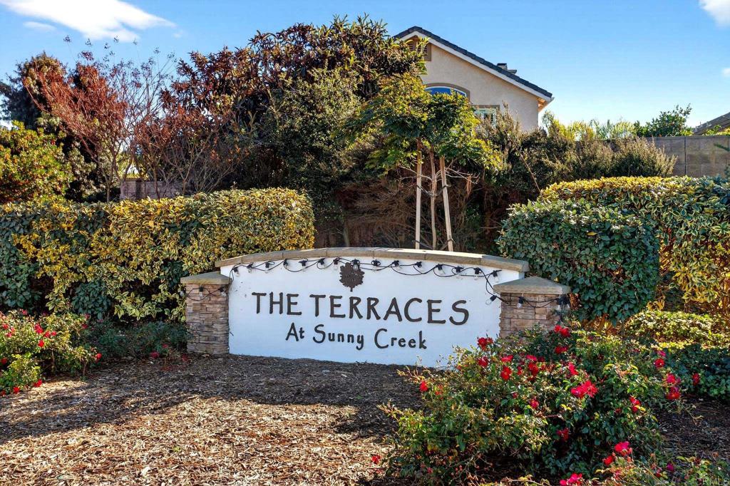 5531 Foxtail Loop Carlsbad, CA 92010 - Photo 3 of 62 a sign on the side of the road