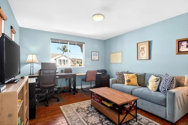 a bathroom with a sink vanity and mirror