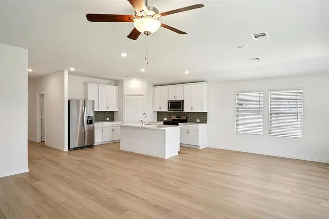 an empty room with windows