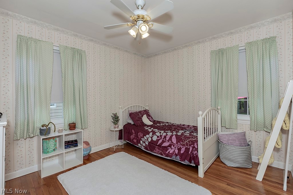 4369 West Anderson Road South Euclid, OH 44121 - Photo 18 of 41 Hardwood flooring with drapes.