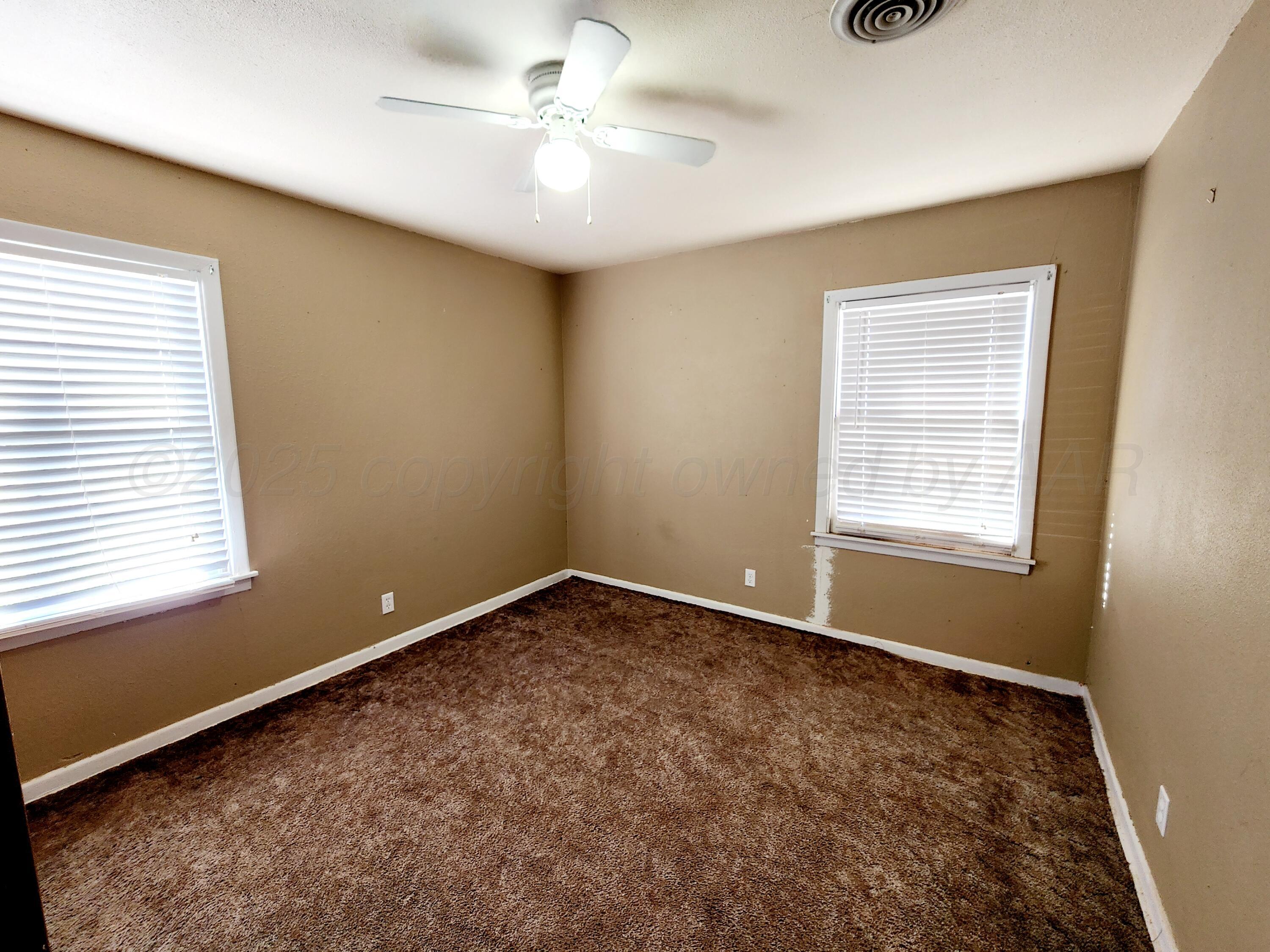 3320 Lynette Drive Amarillo, TX 79109 - Photo 13 of 19 a view of an empty room with a window