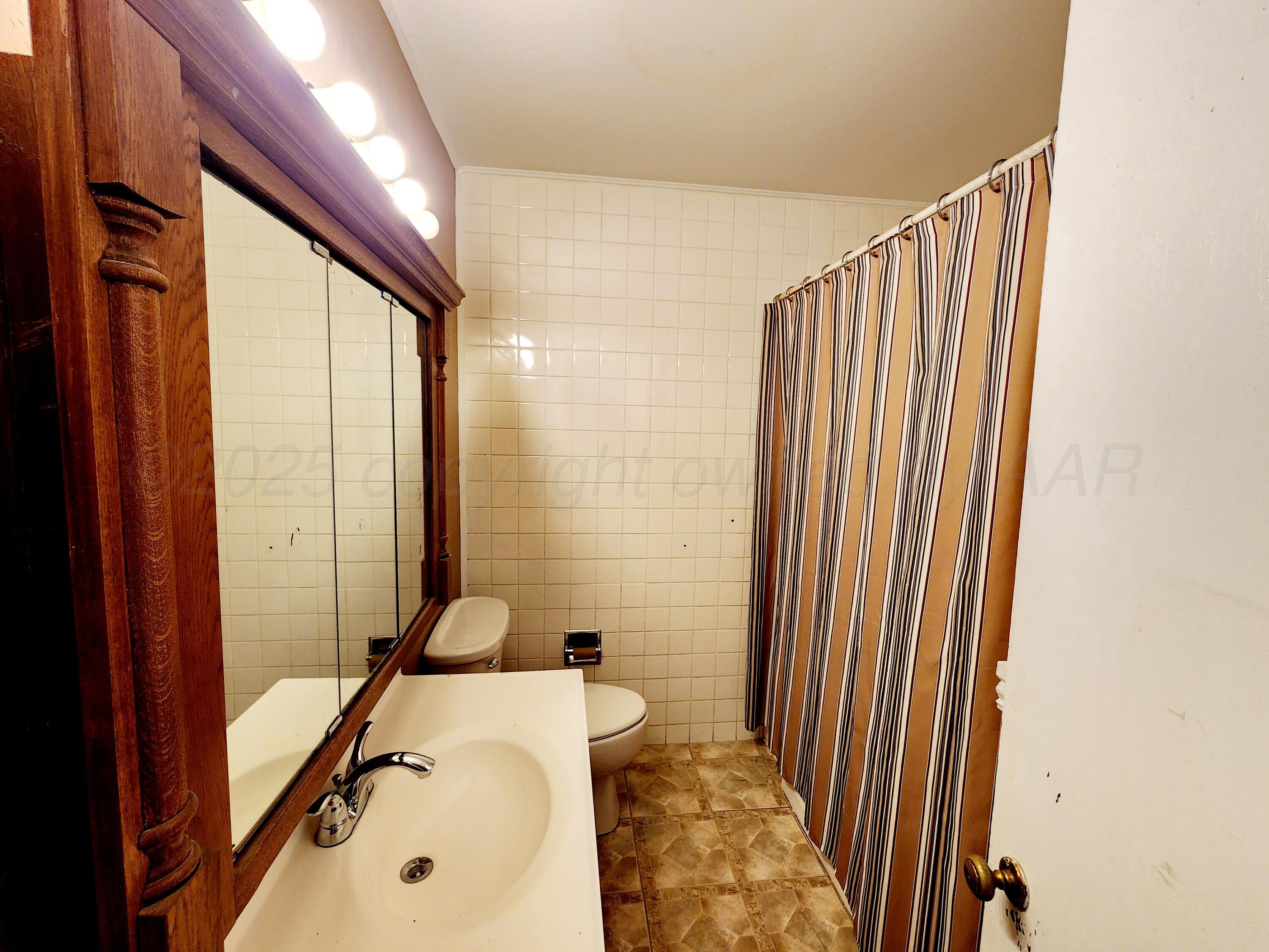 3320 Lynette Drive Amarillo, TX 79109 - Photo 14 of 19 a very nice looking room with a large window