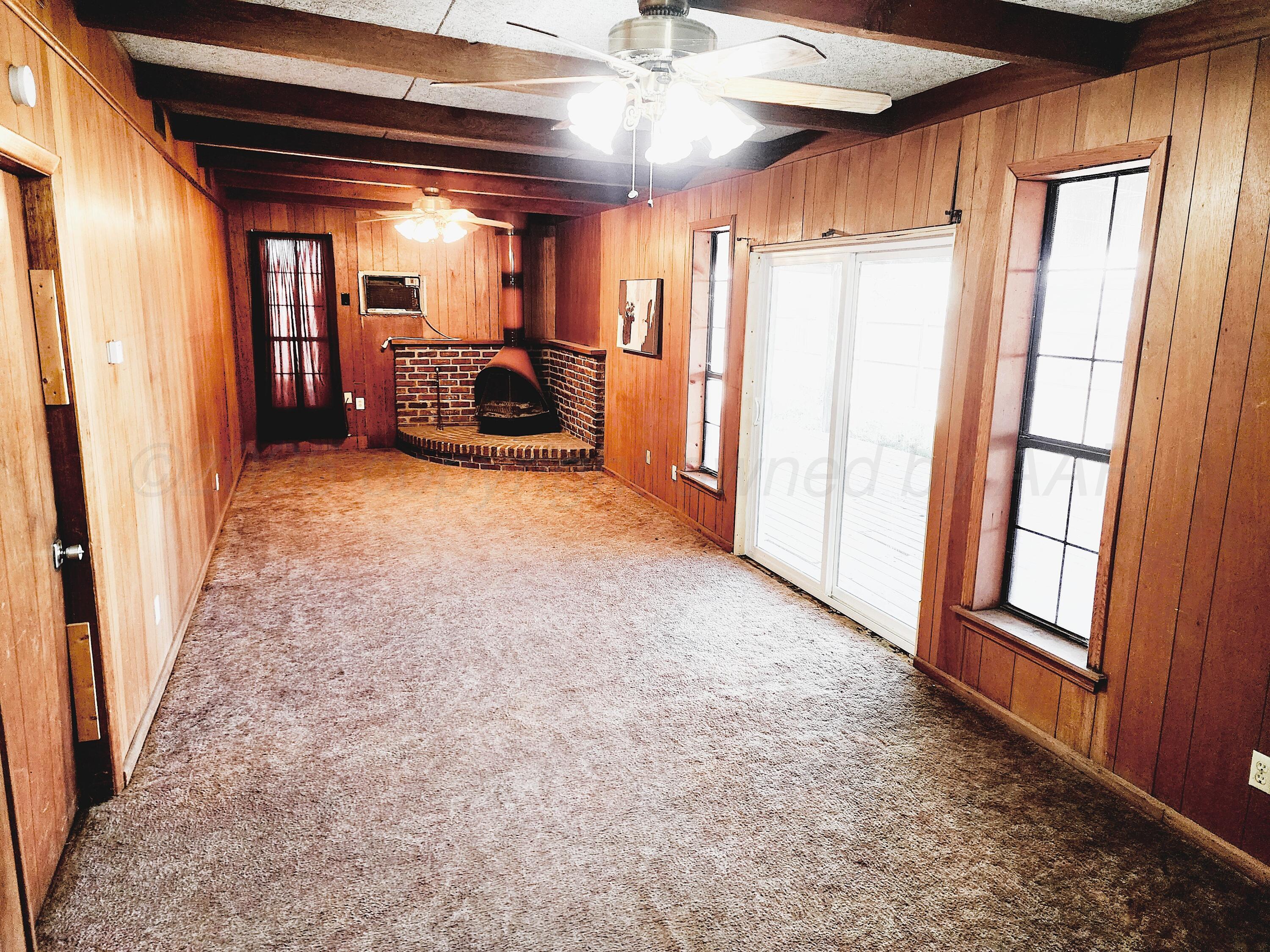 3320 Lynette Drive Amarillo, TX 79109 - Photo 8 of 19 a view of hallway with furniture and a large window